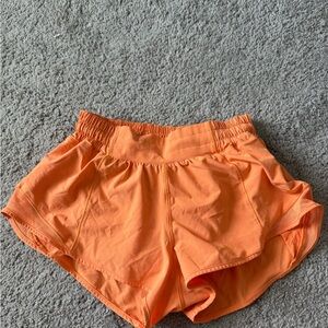 Lululemon Athletica Orange Low Waisted Hotty Hot Shorts